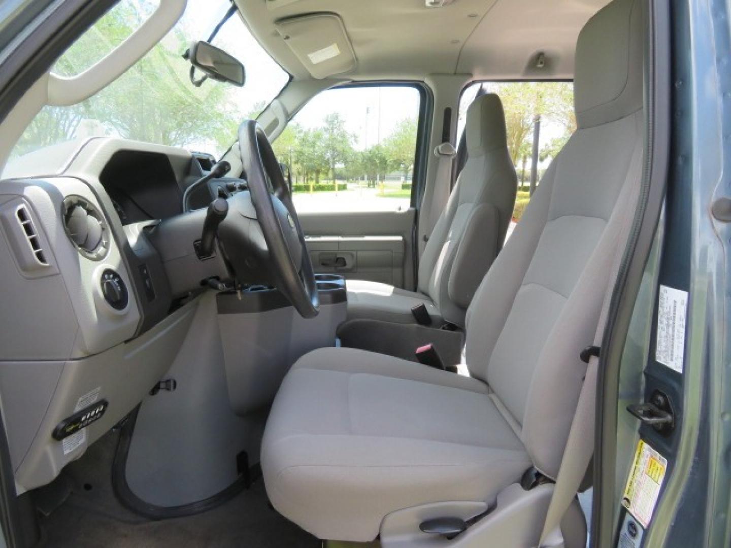 2013 Dark Blue /Gray Ford E-Series Wagon XLT (1FMNE1BW4DD) with an 4.6L V8 engine, Automatic transmission, located at 4301 Oak Circle #19, Boca Raton, FL, 33431, (954) 561-2499, 26.388861, -80.084038 - You are looking at a Gorgeous 2013 Ford E150 XLT Handicap Wheelchair Conversion Van with 22K Original Miles, Tie Down System, Power Electric VMI Side Entry Wheelchair Lift, Back Up Camera, Factory Navigation and Much Much More. This van is Awesome. This is a Nice Rust Free Van with a Clean Carfax, C - Photo#70